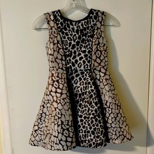 Animal Print sleeveless dress with zip back & metallic accents